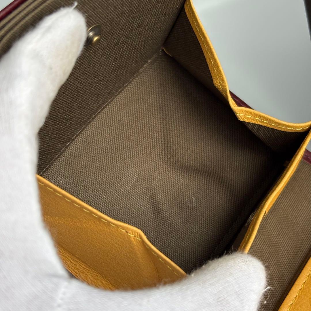 m+ エムピウ ミッレフォッリエⅡ P25 ワイン イエロー 二つ折り財布