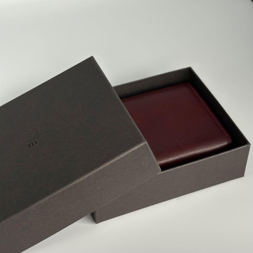 m+ エムピウ ミッレフォッリエⅡ P25 ワイン イエロー 二つ折り財布