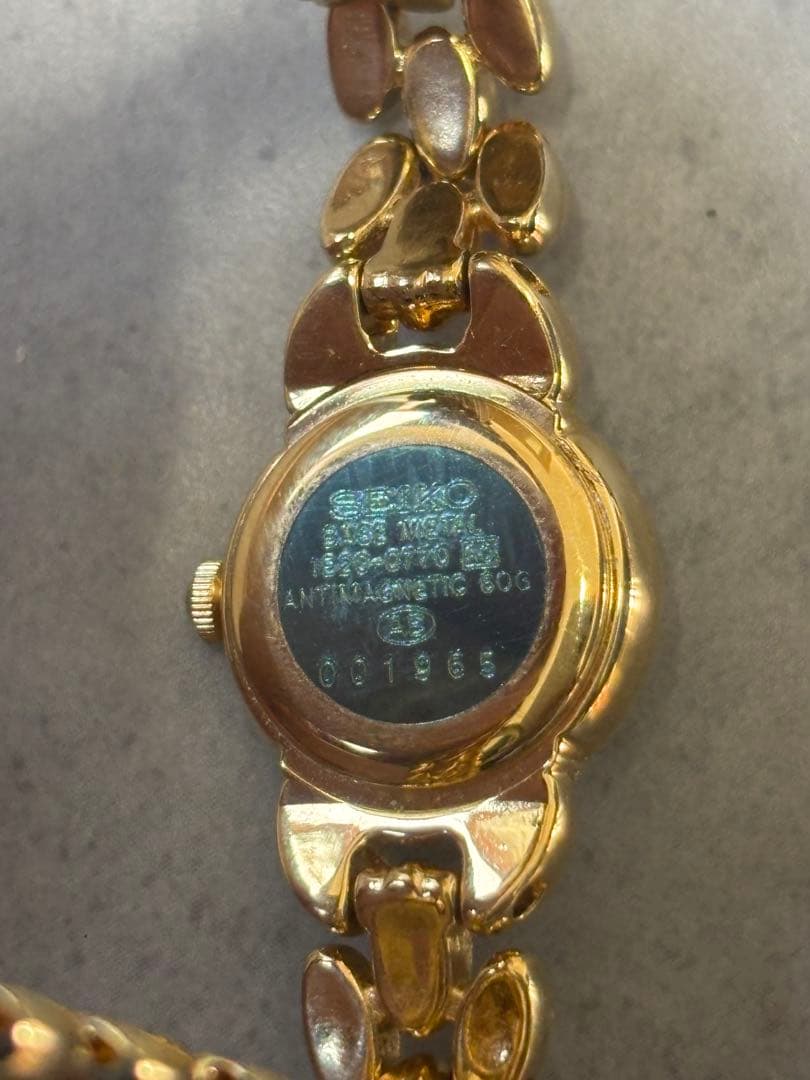 SEIKO セイコー レディース腕時計 1E20-0770 ゴールド ルビー装飾