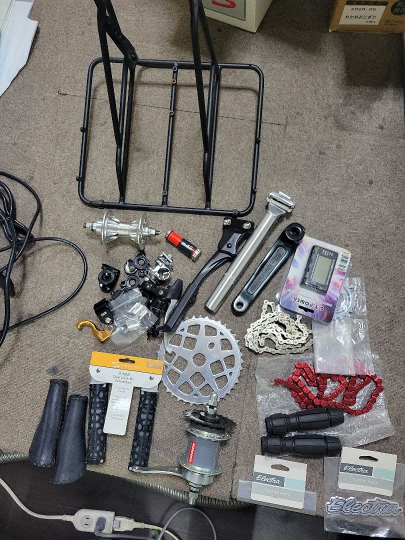 車輪掛け、ハンドルグリップ、自転車持運びカバー、ツェーン