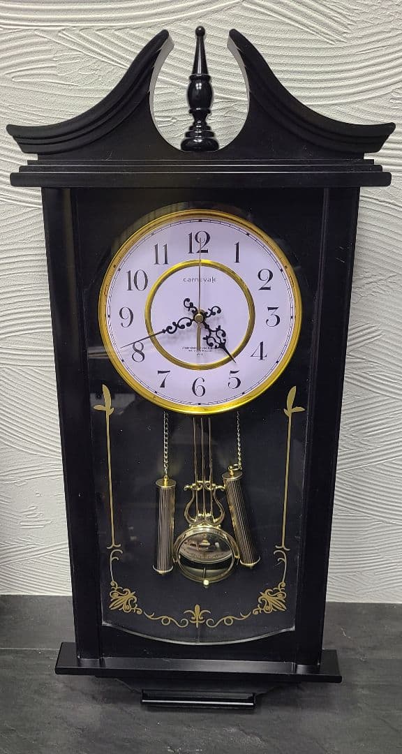 振り子付き黒壁掛け時計 CARNEVALE