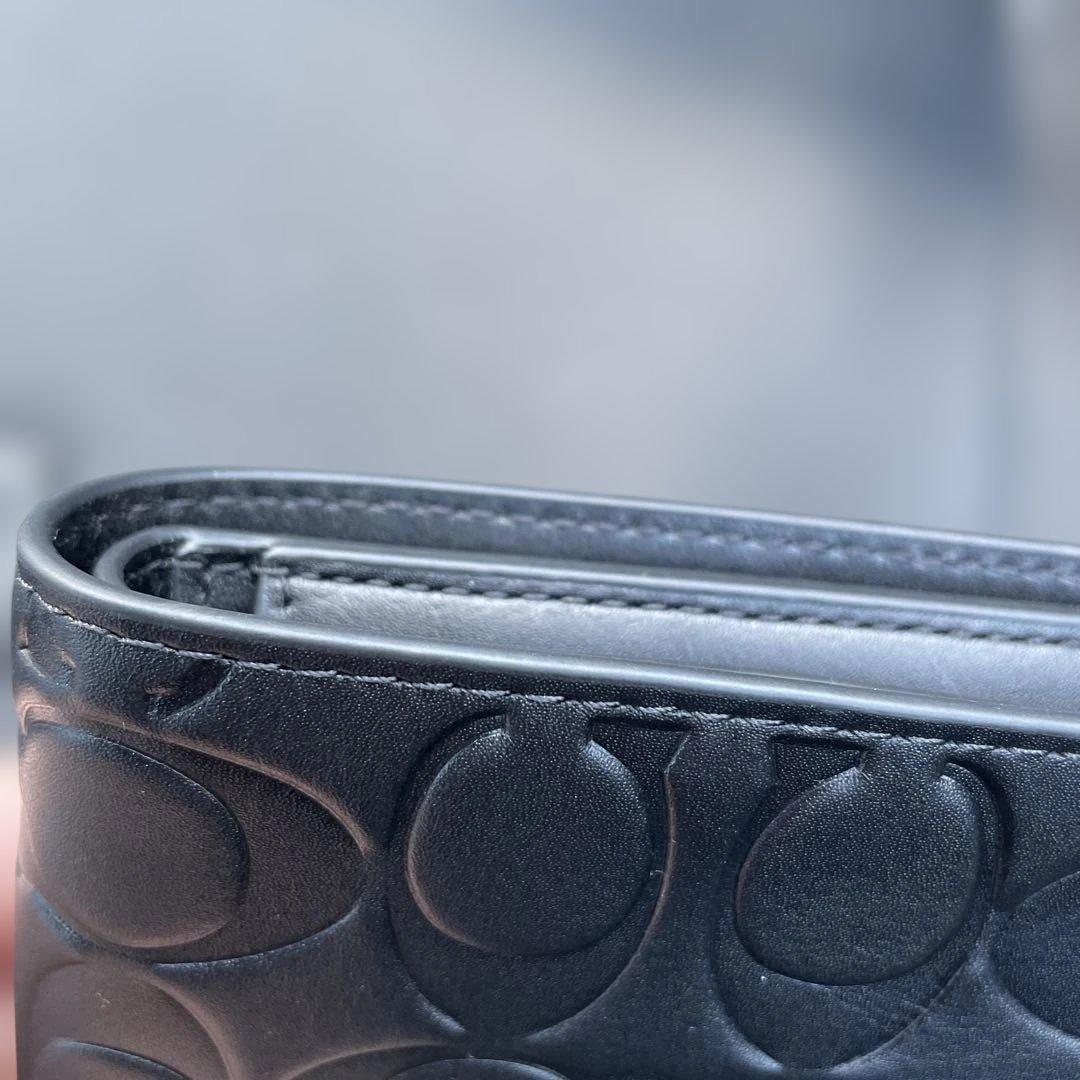 新品　定価55,000円　COACH ブラック　二つ折り財布 エンボス加工