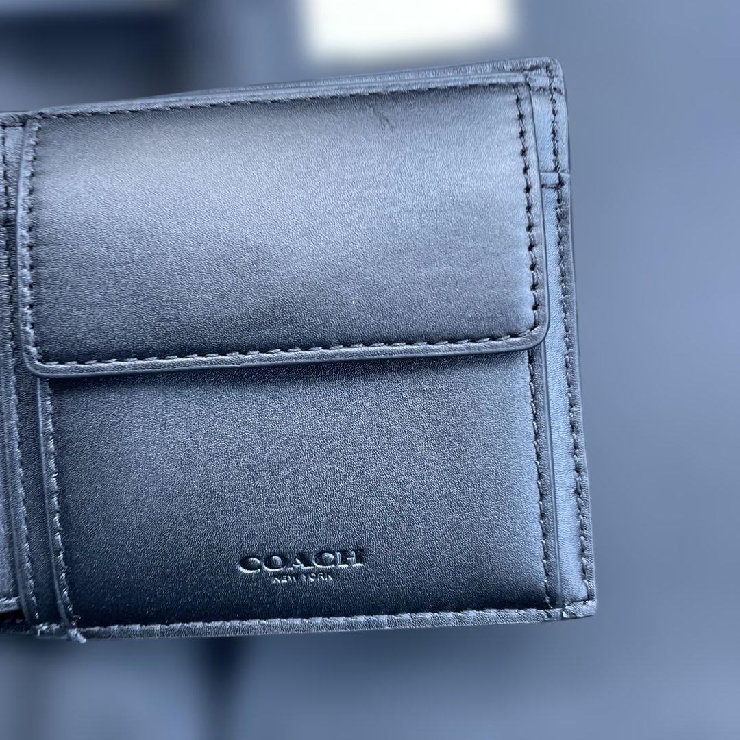 新品　定価55,000円　COACH ブラック　二つ折り財布 エンボス加工