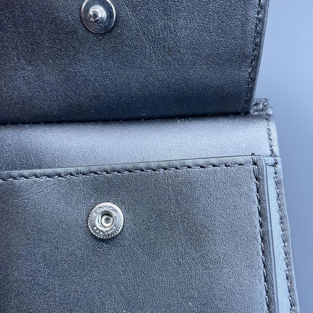 新品　定価55,000円　COACH ブラック　二つ折り財布 エンボス加工