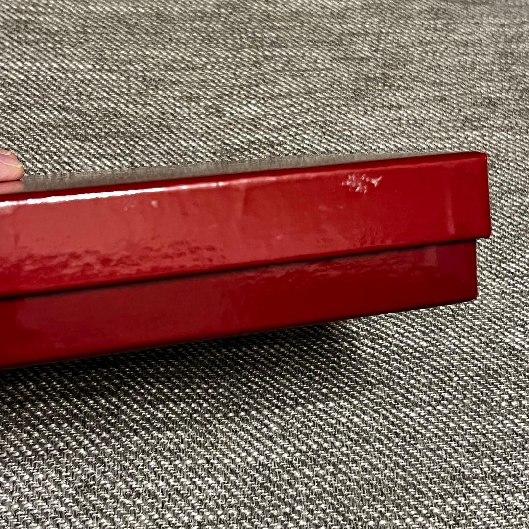 フェラガモ 二つ折り財布 ピンク