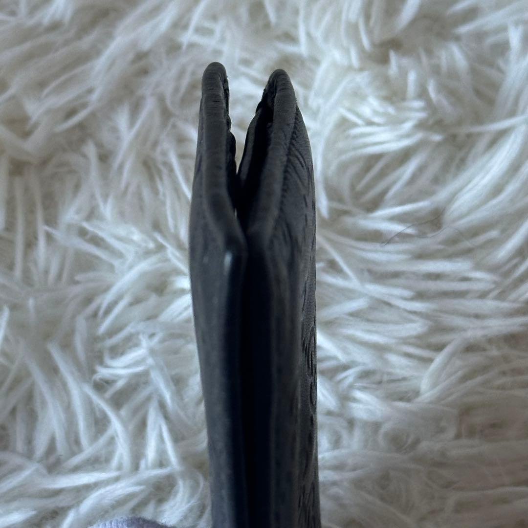 グッチ GGシマ 二つ折り財布 型押し レザー コンパクト 黒 総柄 エンボス