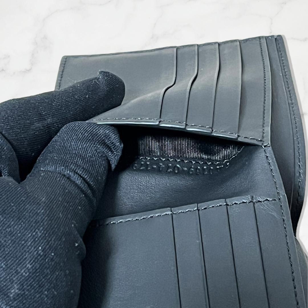 FENDI フェンディ 二つ折り財布 ブラック レザー モンスターアイ メンズ