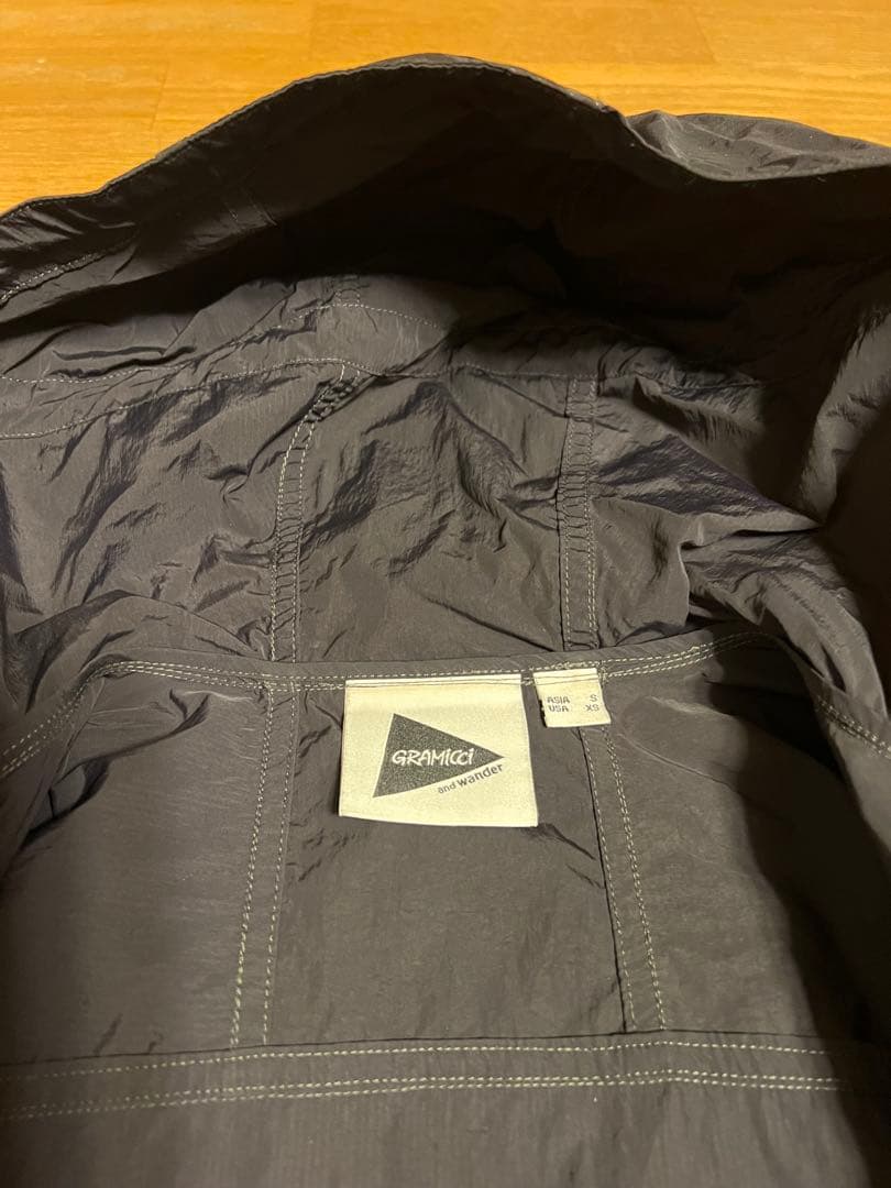 Gramicci x AND WANDERパッチワークウィンドパーカー Sサイズ