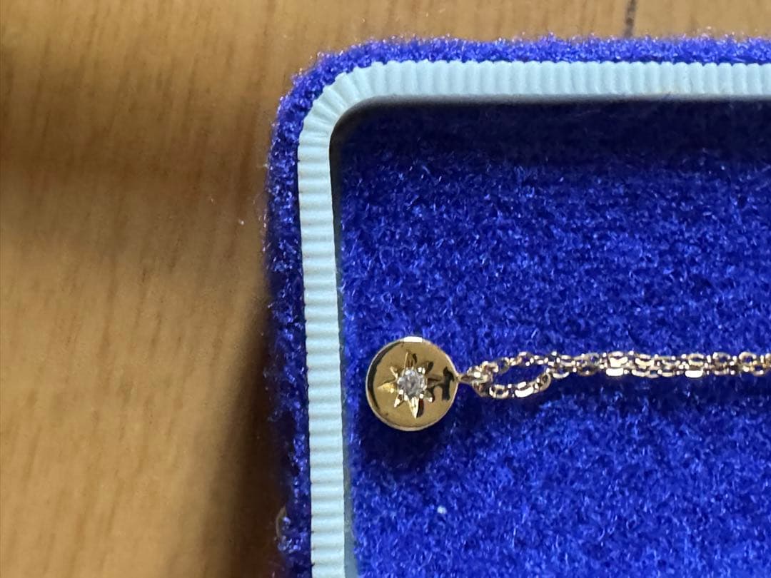 金色の星のコンパスデザインのリングとネックレスセット