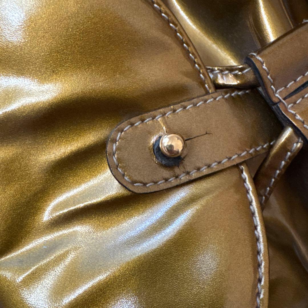 GUCCI エナメルゴールドバックパック