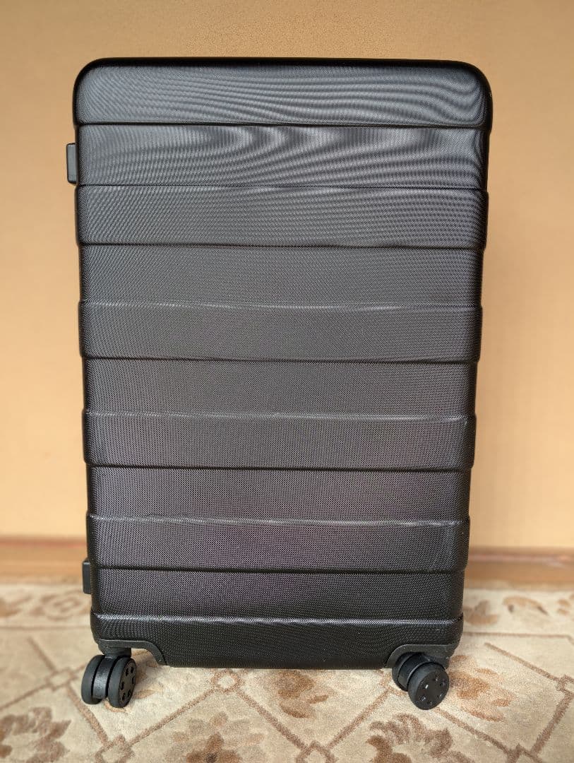 無印：キャリーバーの高さを自由に調節できるストッパー付きハードキャリー（62L）