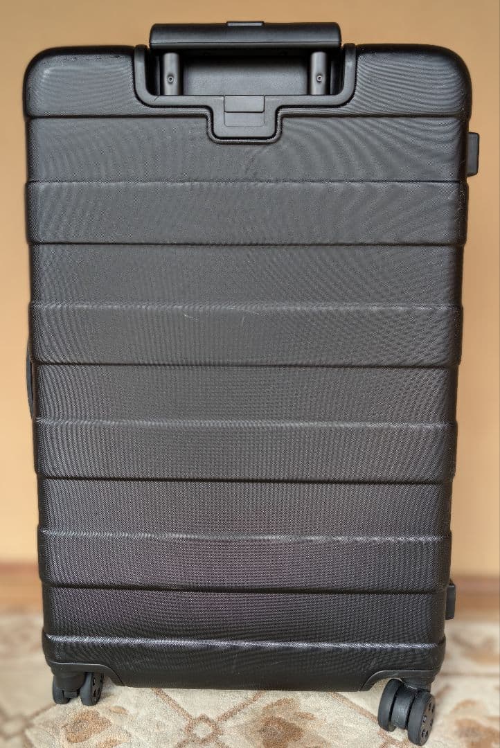 無印：キャリーバーの高さを自由に調節できるストッパー付きハードキャリー（62L）