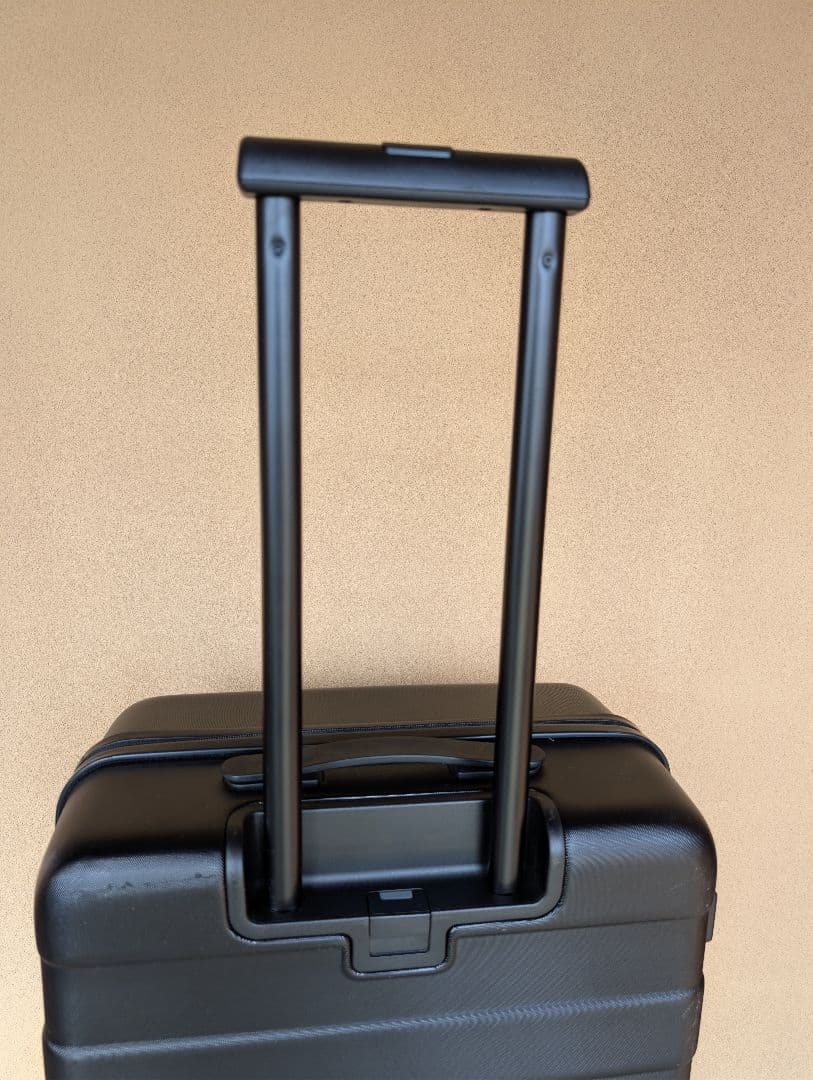 無印：キャリーバーの高さを自由に調節できるストッパー付きハードキャリー（62L）