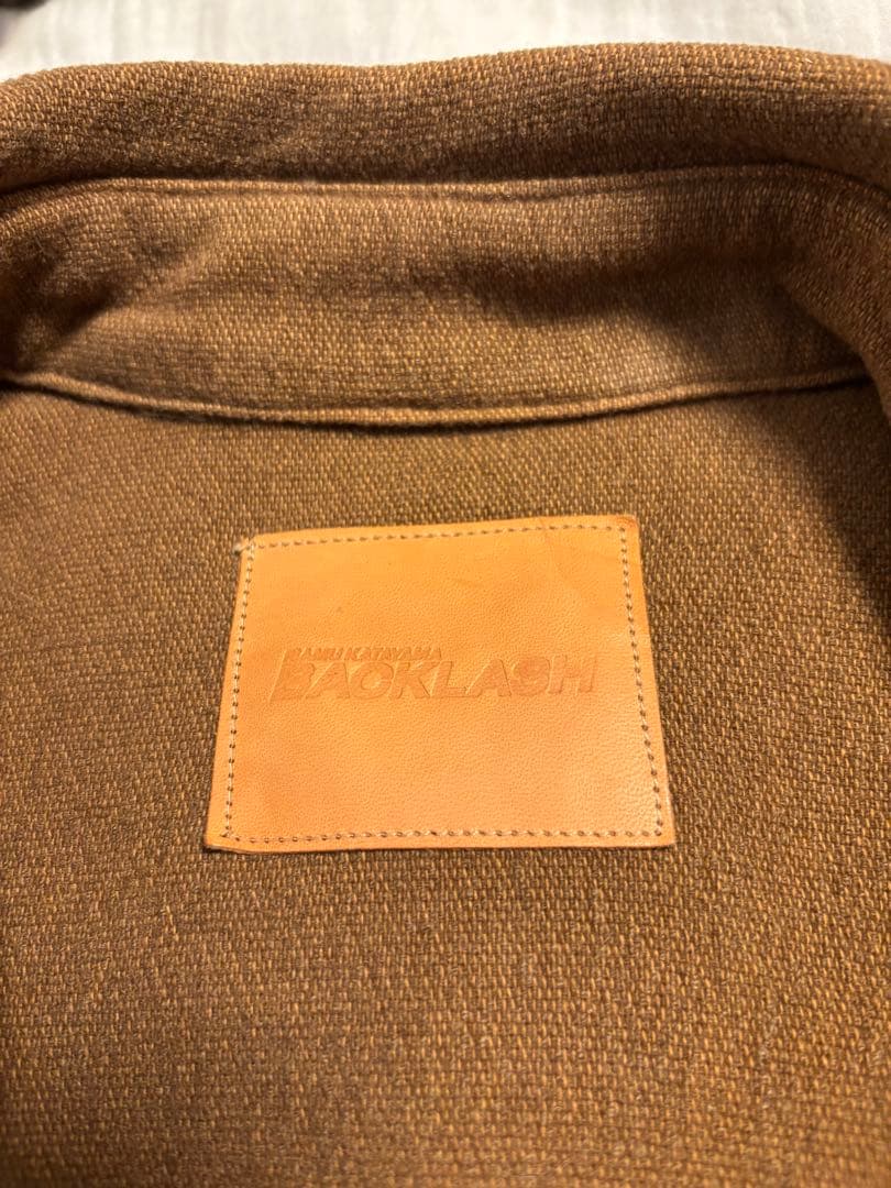 イサムカタヤマ　バックラッシュ　BACKLASH 　トレンチコート　isamu