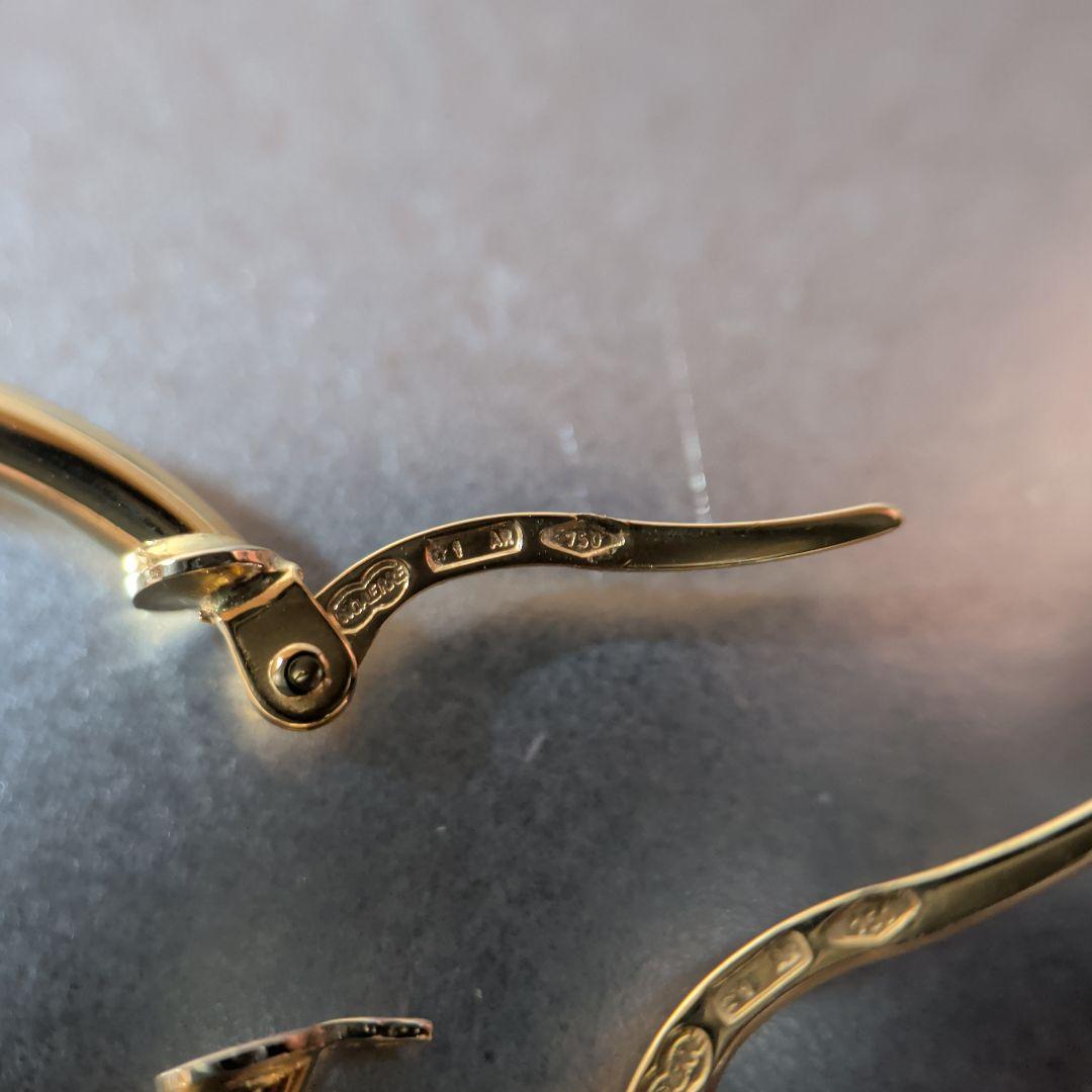 ピアス　UNOAERRE　750　YG　スナップ　ウェーブ　2.59g