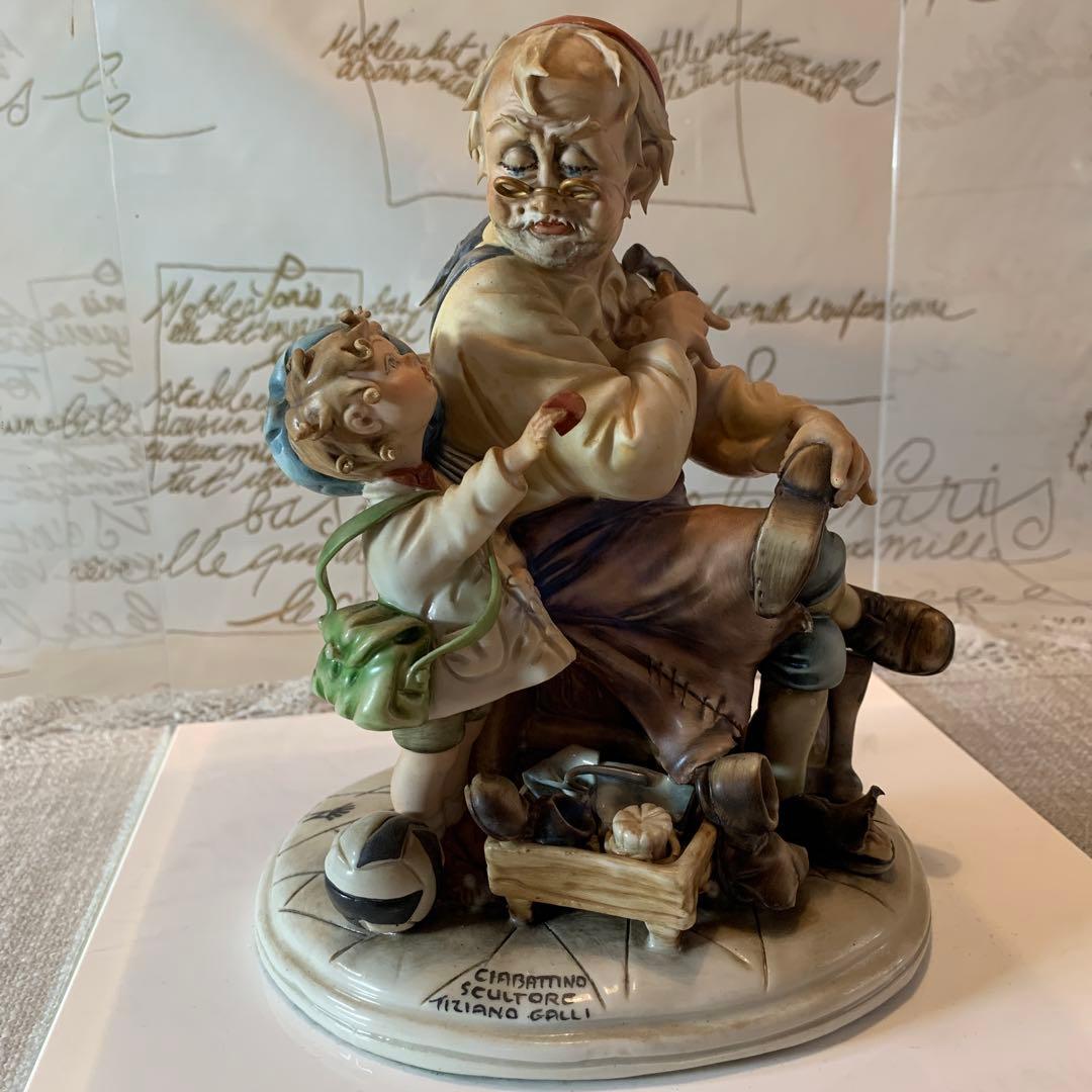 イタリア製　カポテモンテ　靴屋の叔父さんと少年の陶器人形！まつ毛まで陶器です！