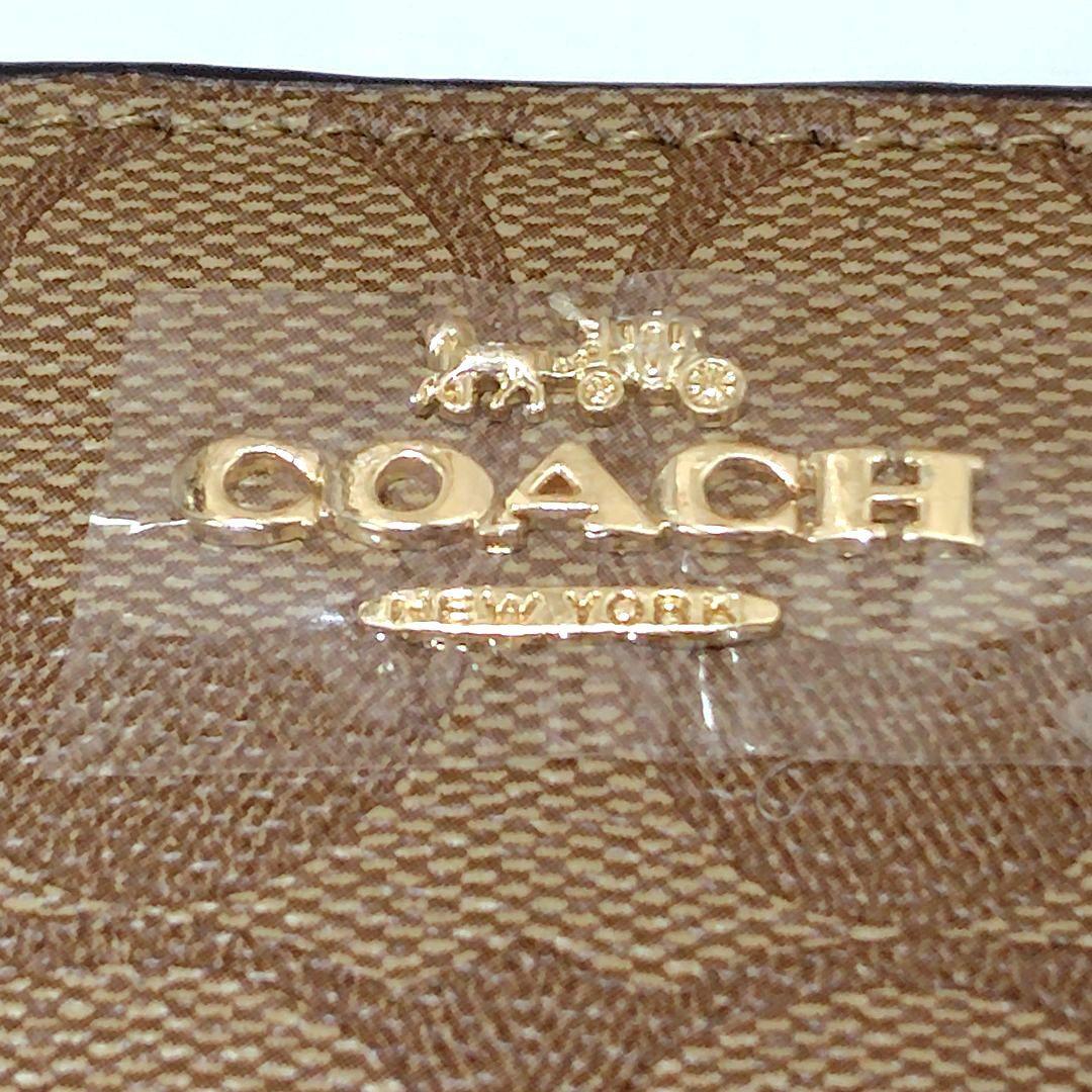 新品未使用⭐COACH ブラウン 二つ折り財布　シグネチャー　馬車ロゴ