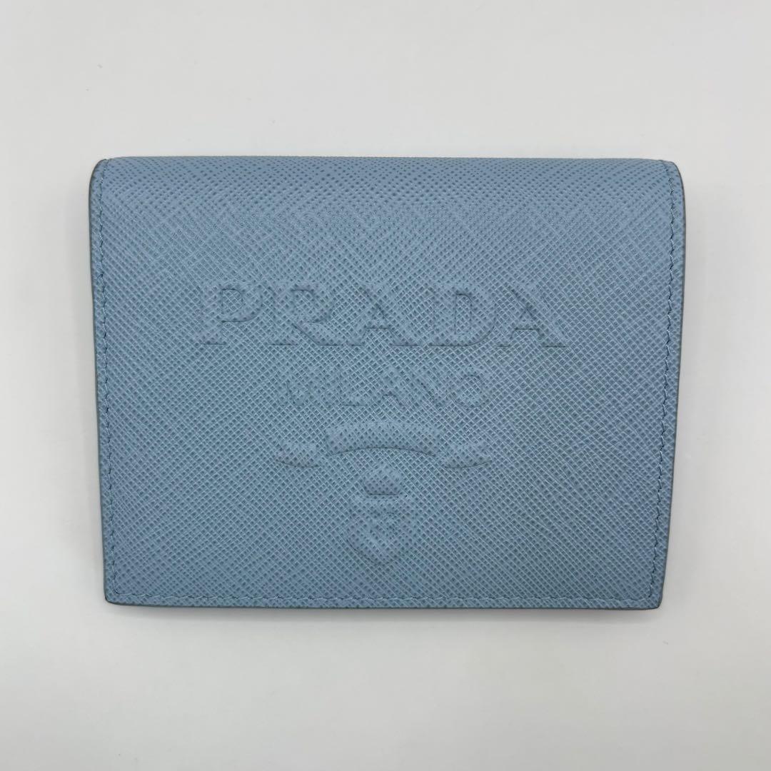 美品　PRADA 二つ折り財布　サフィアーノエンボス　ライトブルー 1MV204