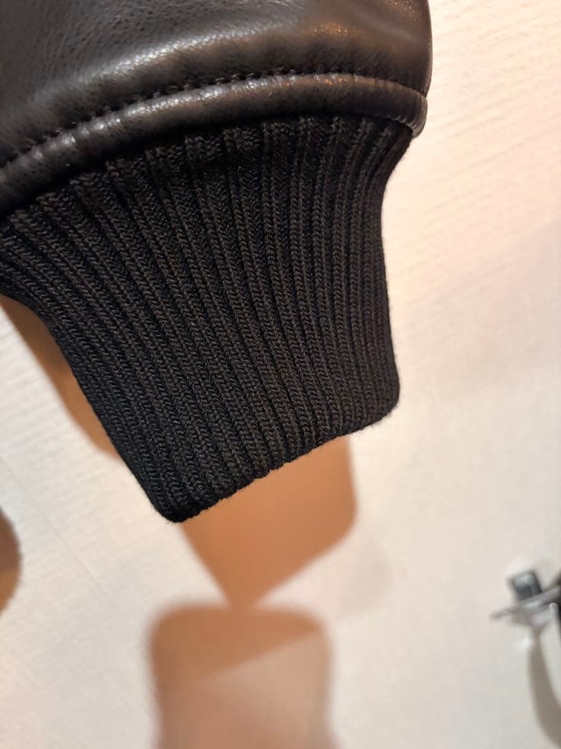 ALPHA INDUSTRIES フーデッドリブジャケット フェイクレザー