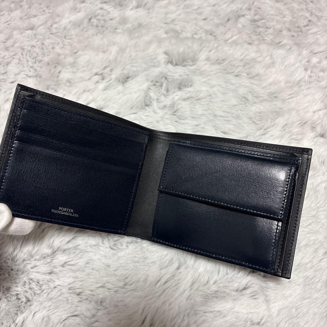 ポーター　プリュム　二つ折り財布　ロゴプレート　ネイビー　レザー