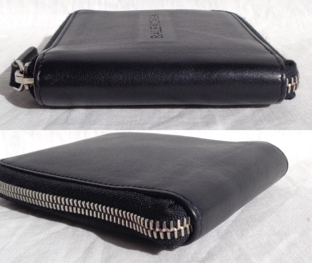美品 BALENCIAGA パンチングロゴレザーラウンドジップ二つ折り財布 黒