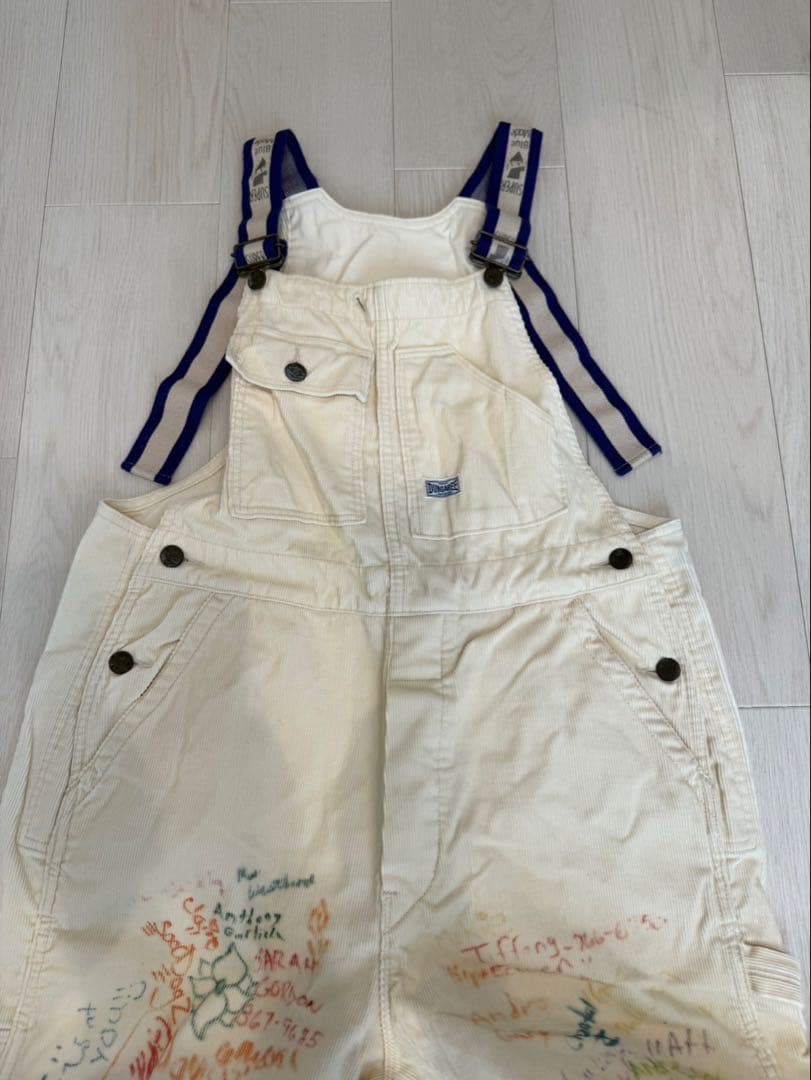 手描きイラスト付きクリーム色サロペット