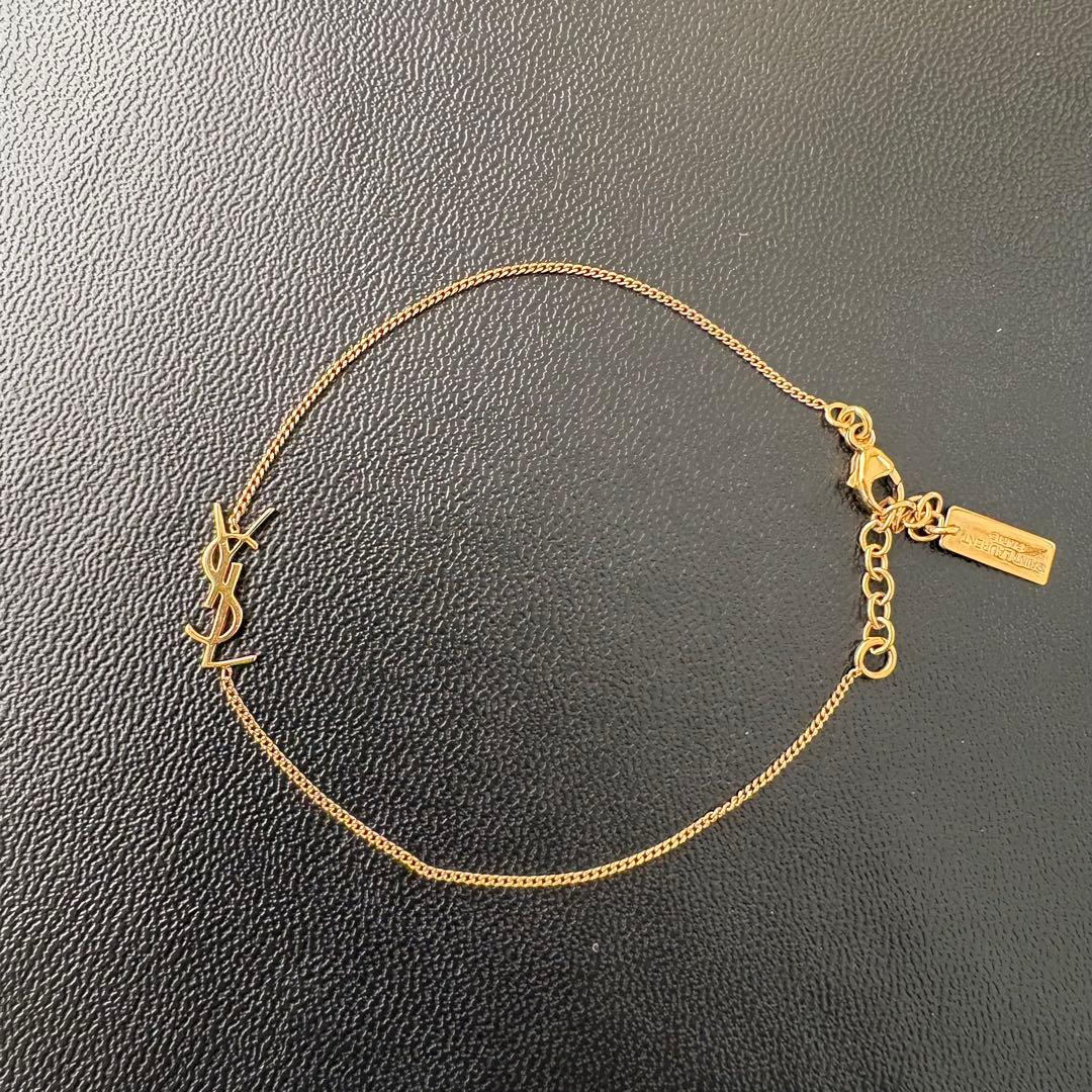 SAINT LAURENT カサンドラ　ロゴブレスレット ゴールド