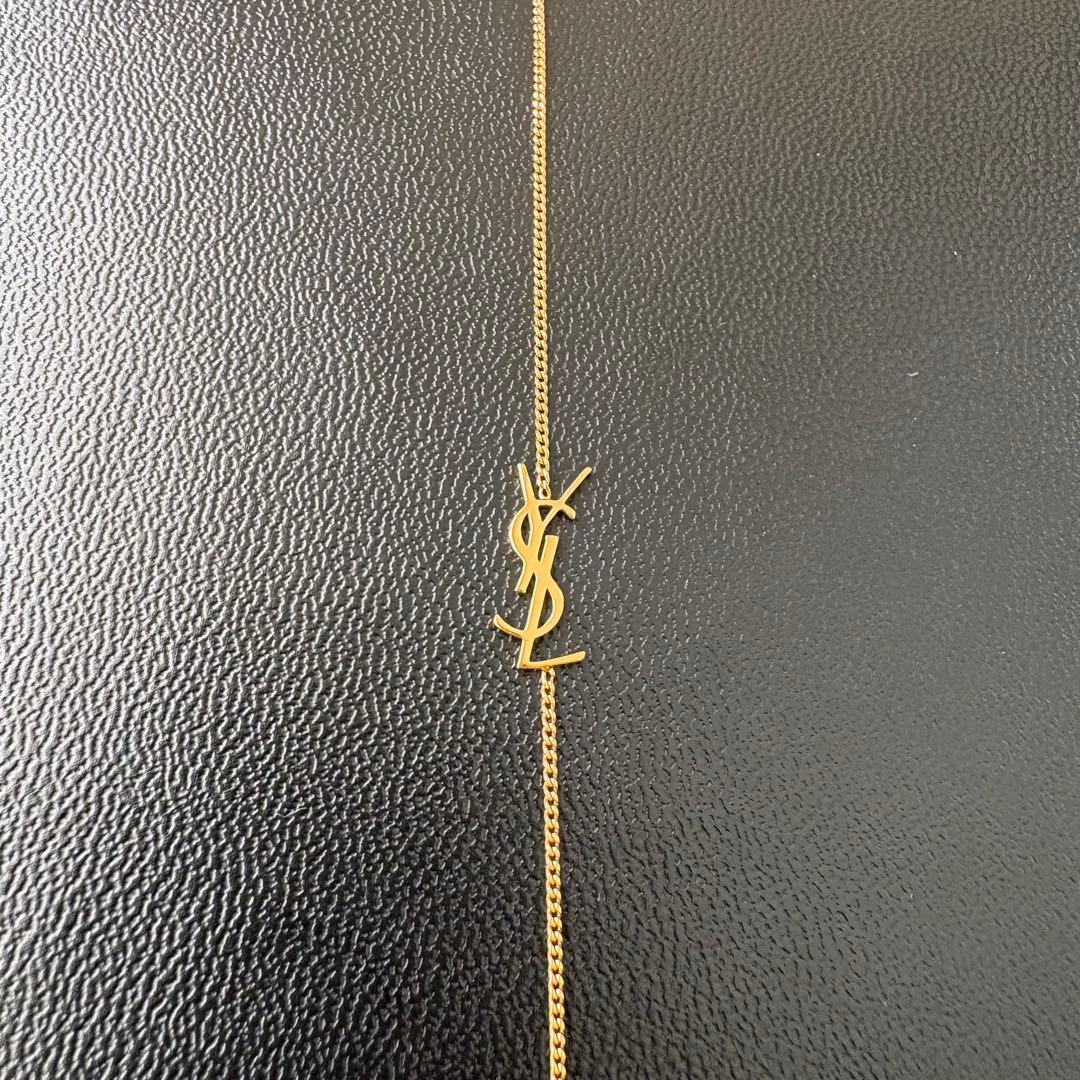 SAINT LAURENT カサンドラ　ロゴブレスレット ゴールド