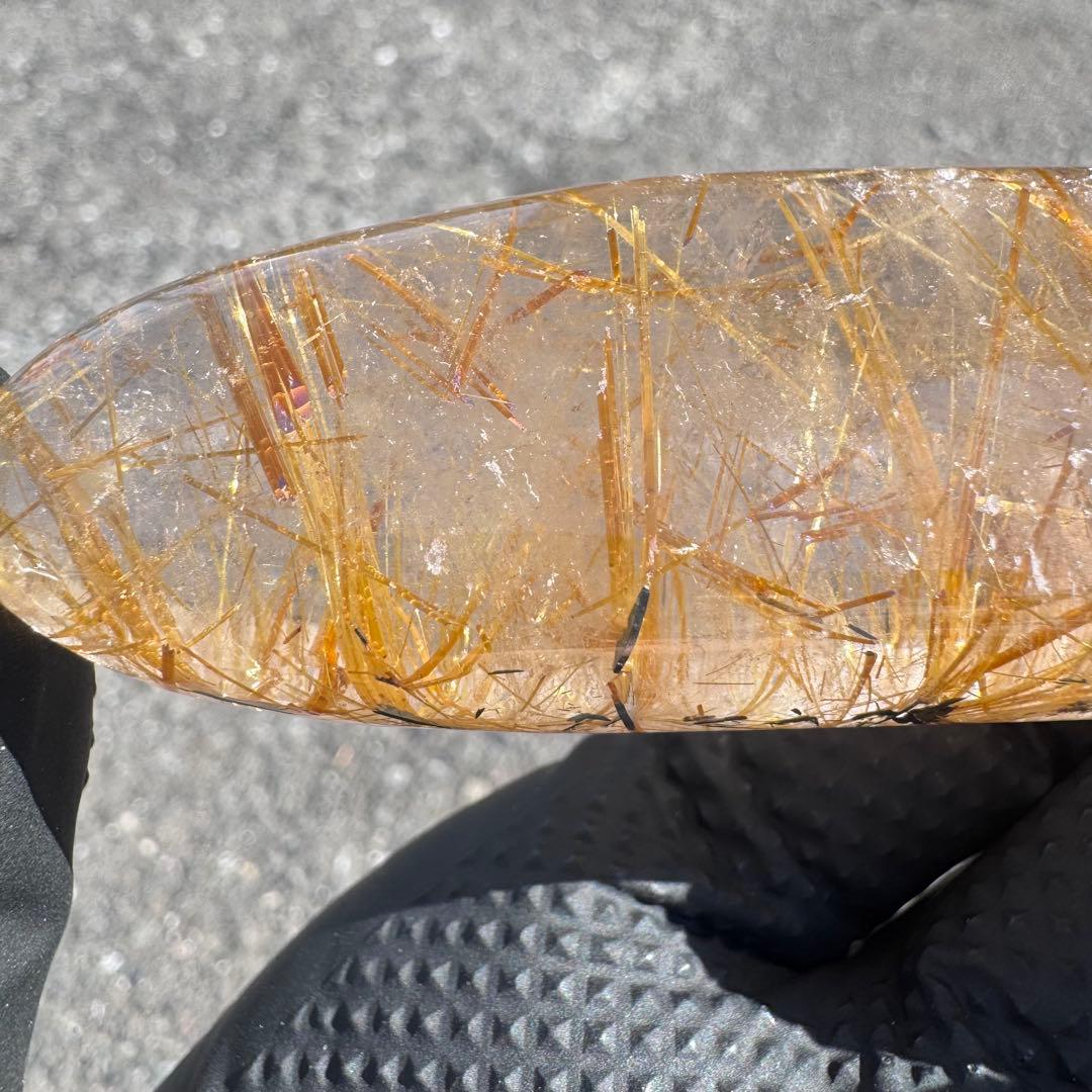 G-178タイチンルチル研磨石　ゴールドルチル放射状原石　天然石119g