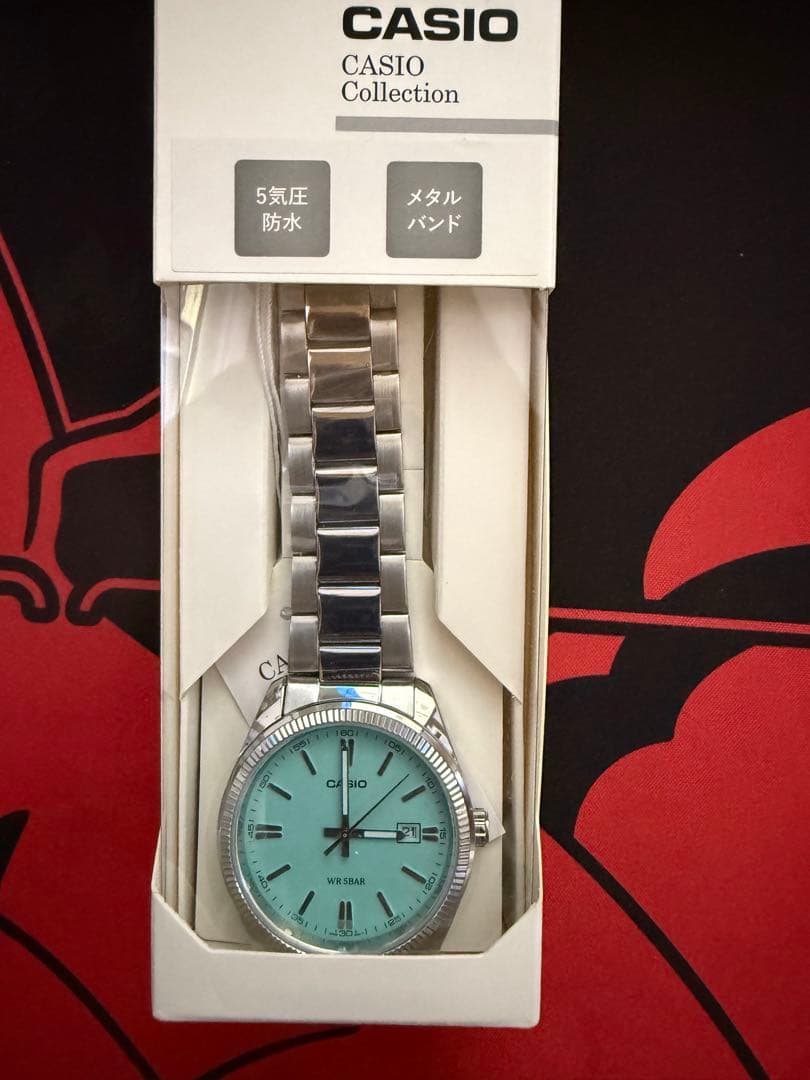 CASIO グリーンカラー デイトアナログモデル ターコイズブルー