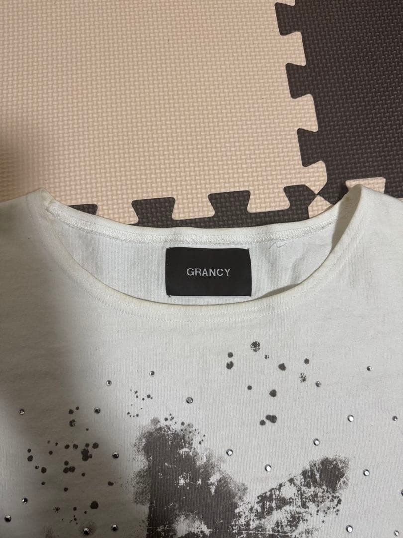 【grancy】ラインストーンデザイングラフィックダメージ ロンT