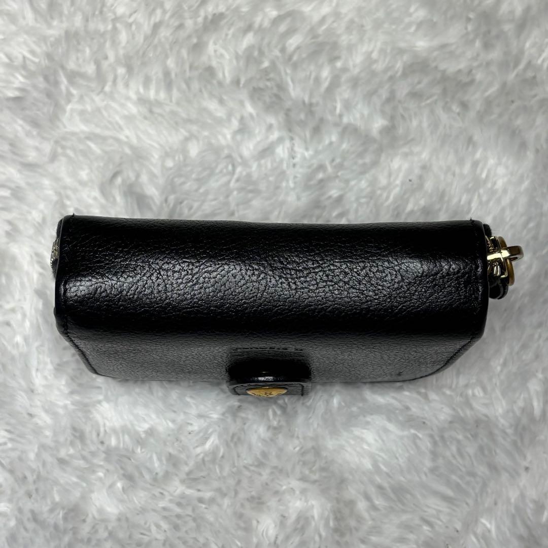 IL BISONTE イルビゾンテ 二つ折り財布 黒 ラウンドジップ 金ボタン