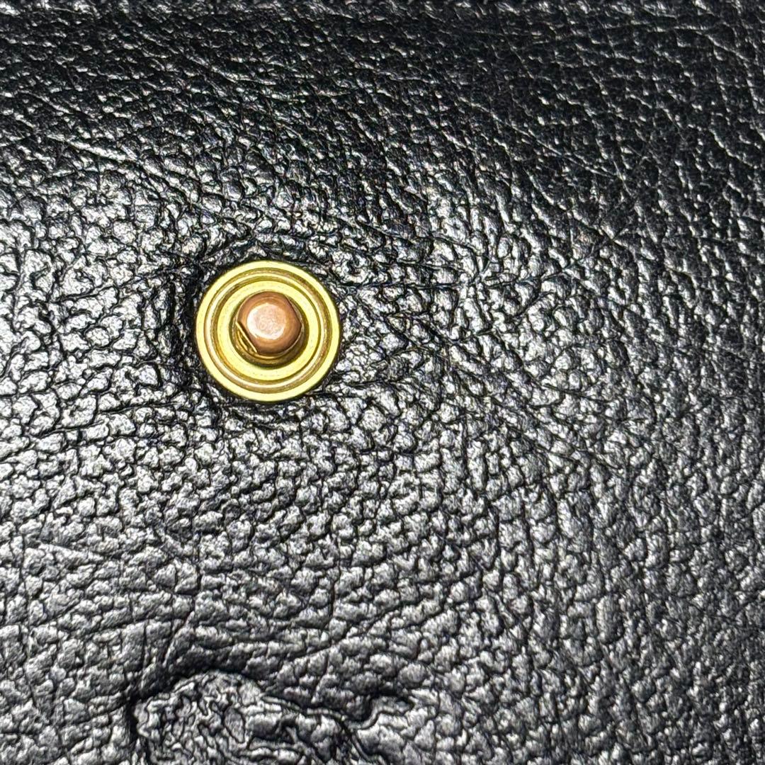 IL BISONTE イルビゾンテ 二つ折り財布 黒 ラウンドジップ 金ボタン