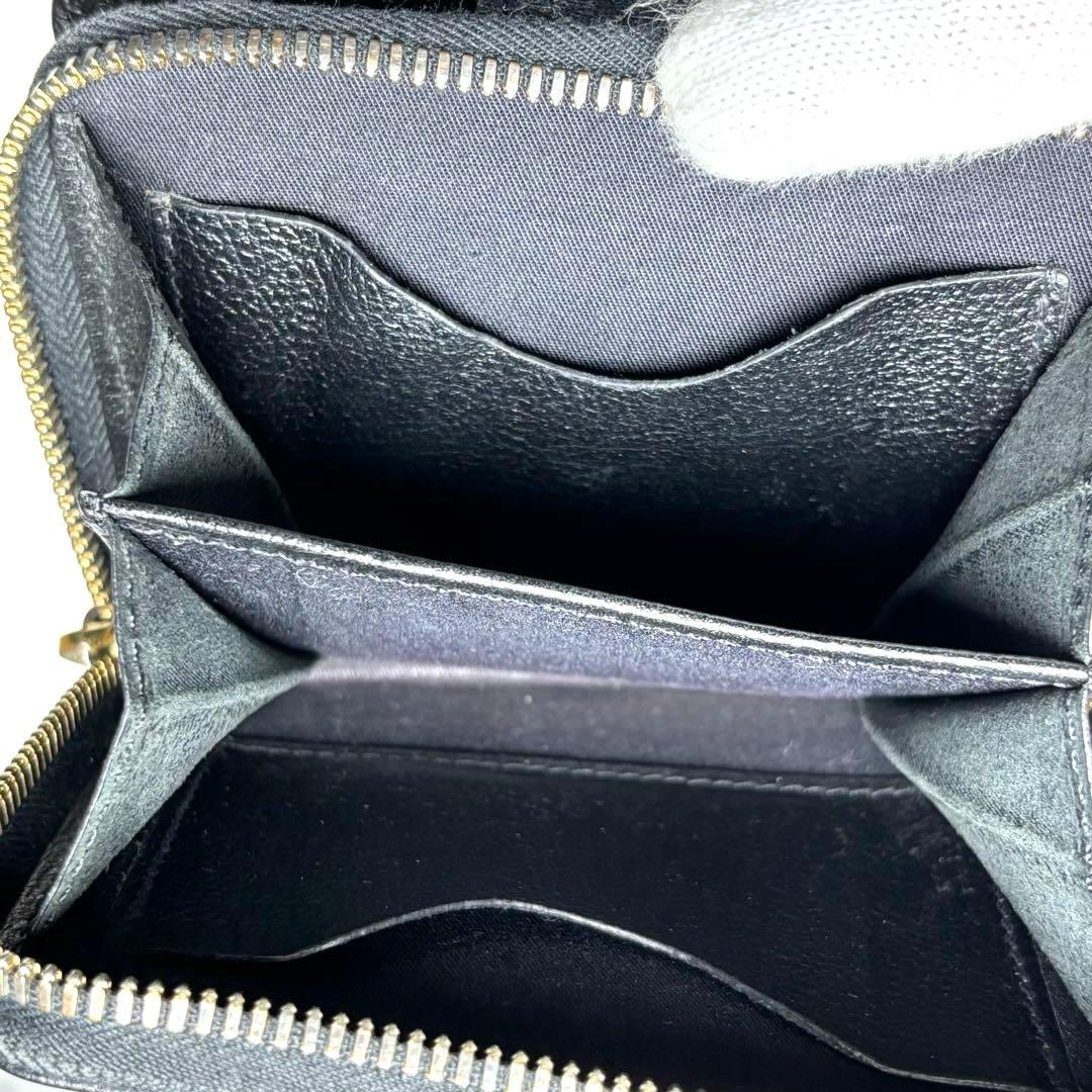 IL BISONTE イルビゾンテ 二つ折り財布 黒 ラウンドジップ 金ボタン