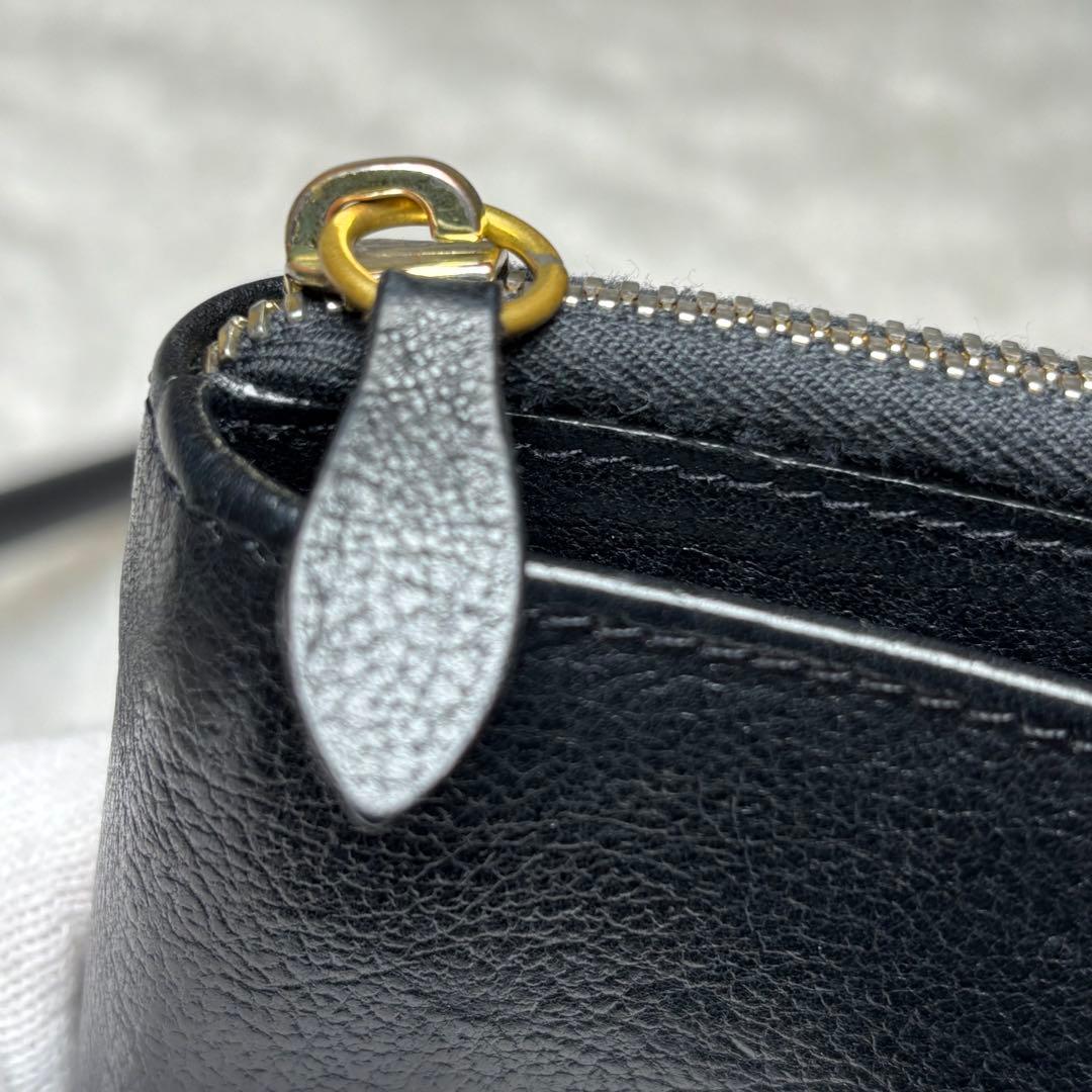 IL BISONTE イルビゾンテ 二つ折り財布 黒 ラウンドジップ 金ボタン