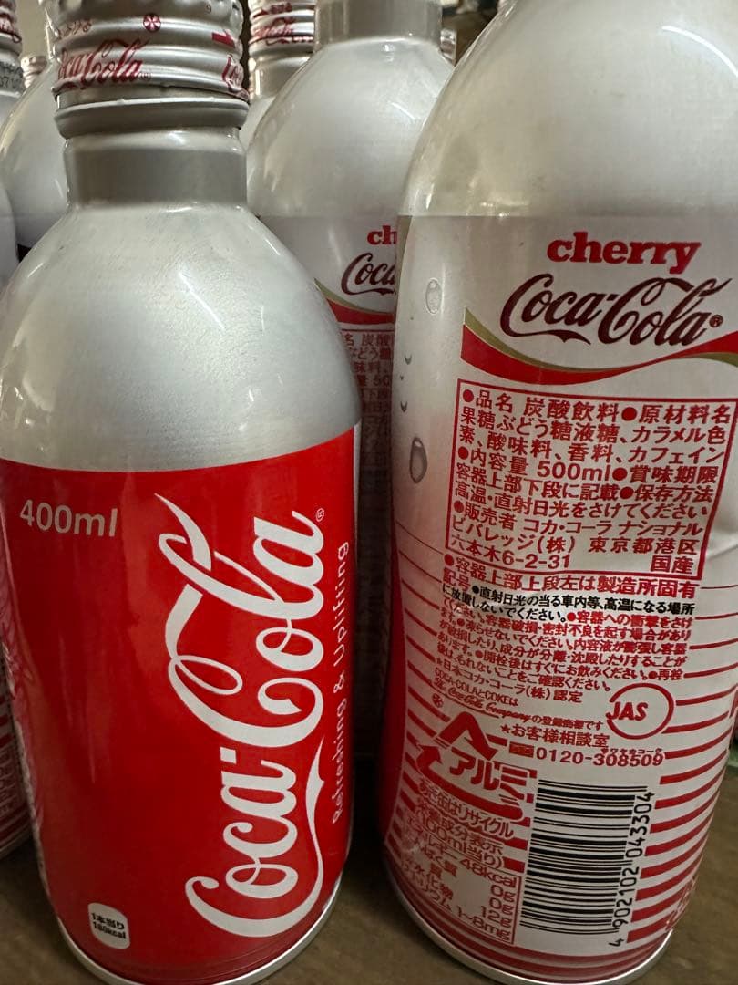 チェリーコークのボトル缶【空缶】23本とカートン+コカコーラボトル缶【空缶】