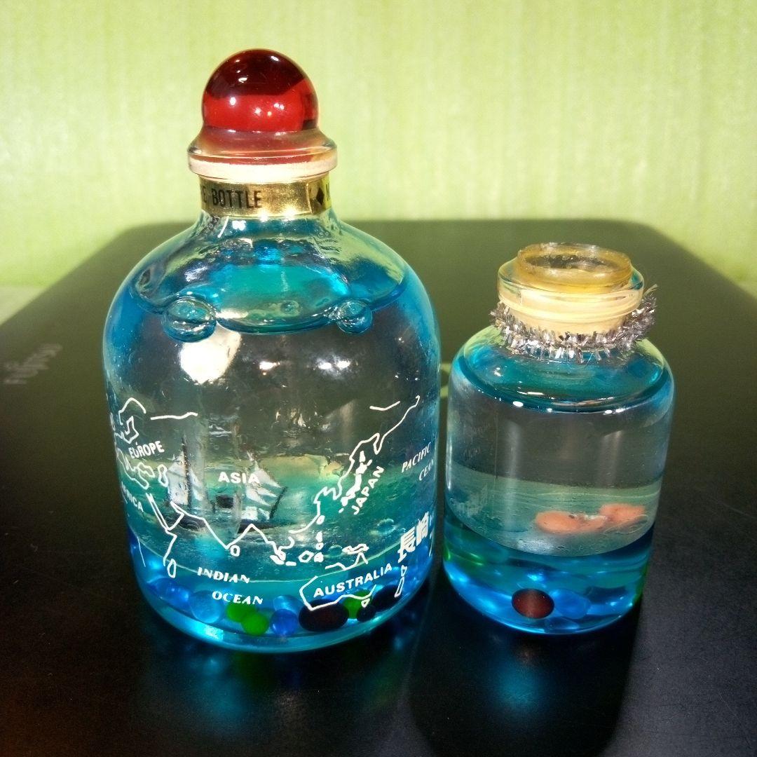 ①黒船　長崎オランダ村　ミニチュアボトル　②ラッコ　オイルドーム　①②セット