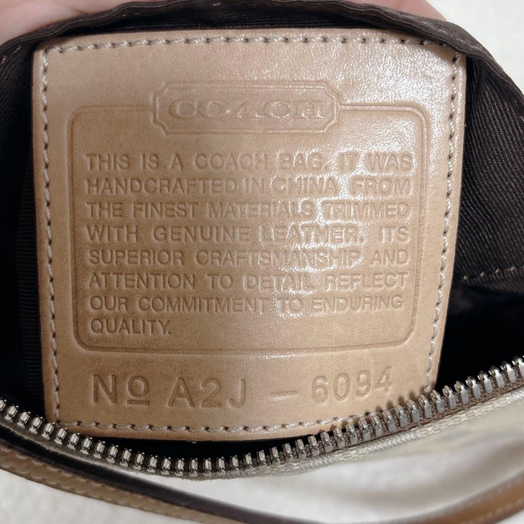 【良品】COACH アクセサリーポーチ シグネチャー　ベージュ