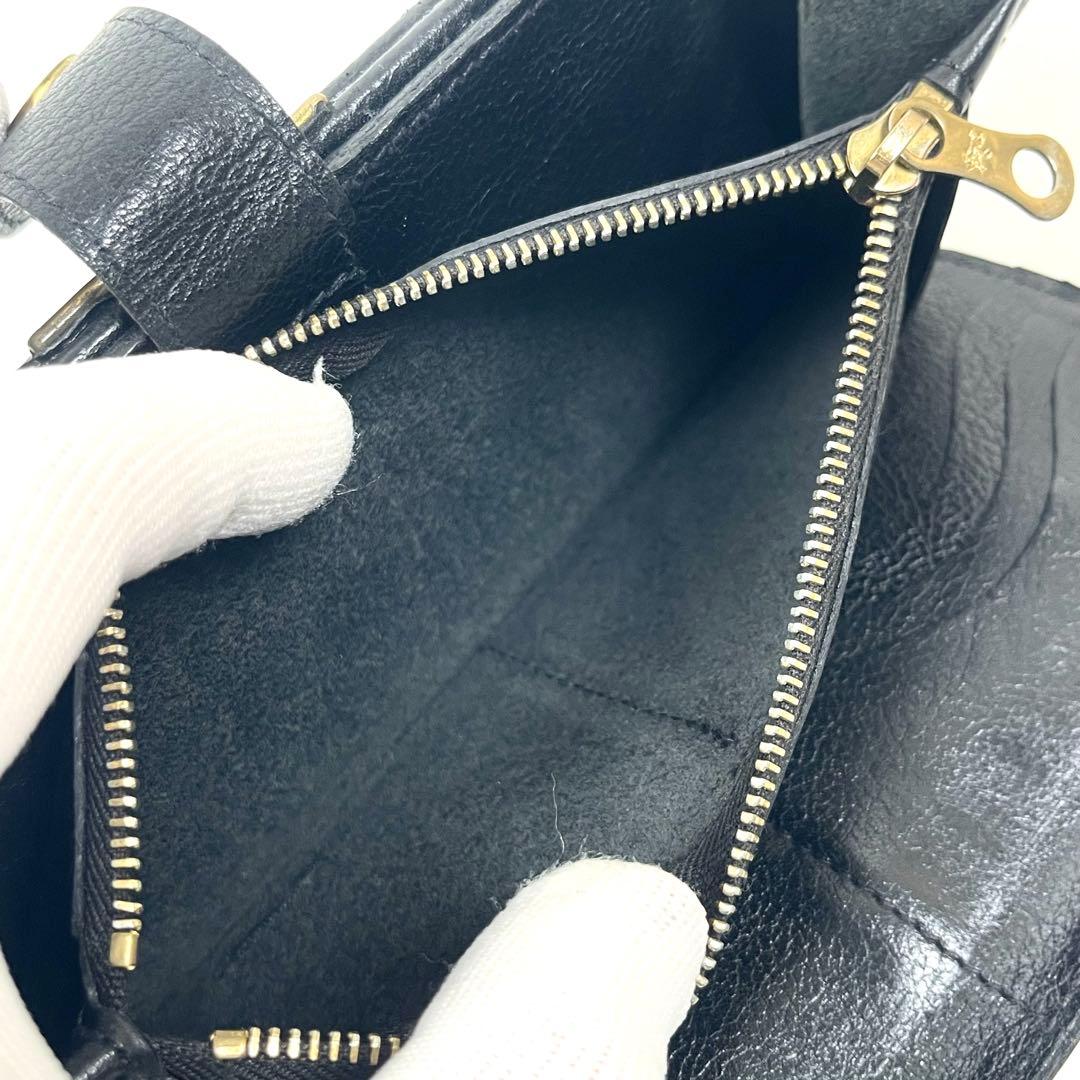 イルビゾンテ　長財布　希少　がま口　二つ折り　ロゴ型押し　オールレザー　ブラック