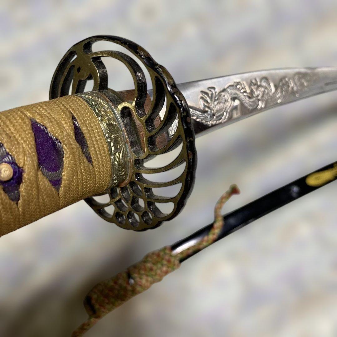 模造刀 太刀 金茶柄 鶴羽透し丸鍔 太刀造り龍図黒呂鞘