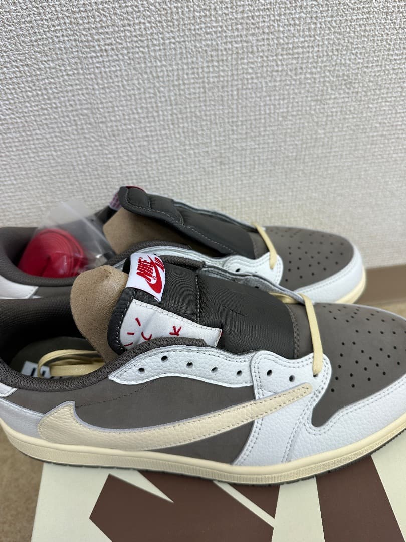 Travis Scott × Nike Air Jordan 1 Low OG