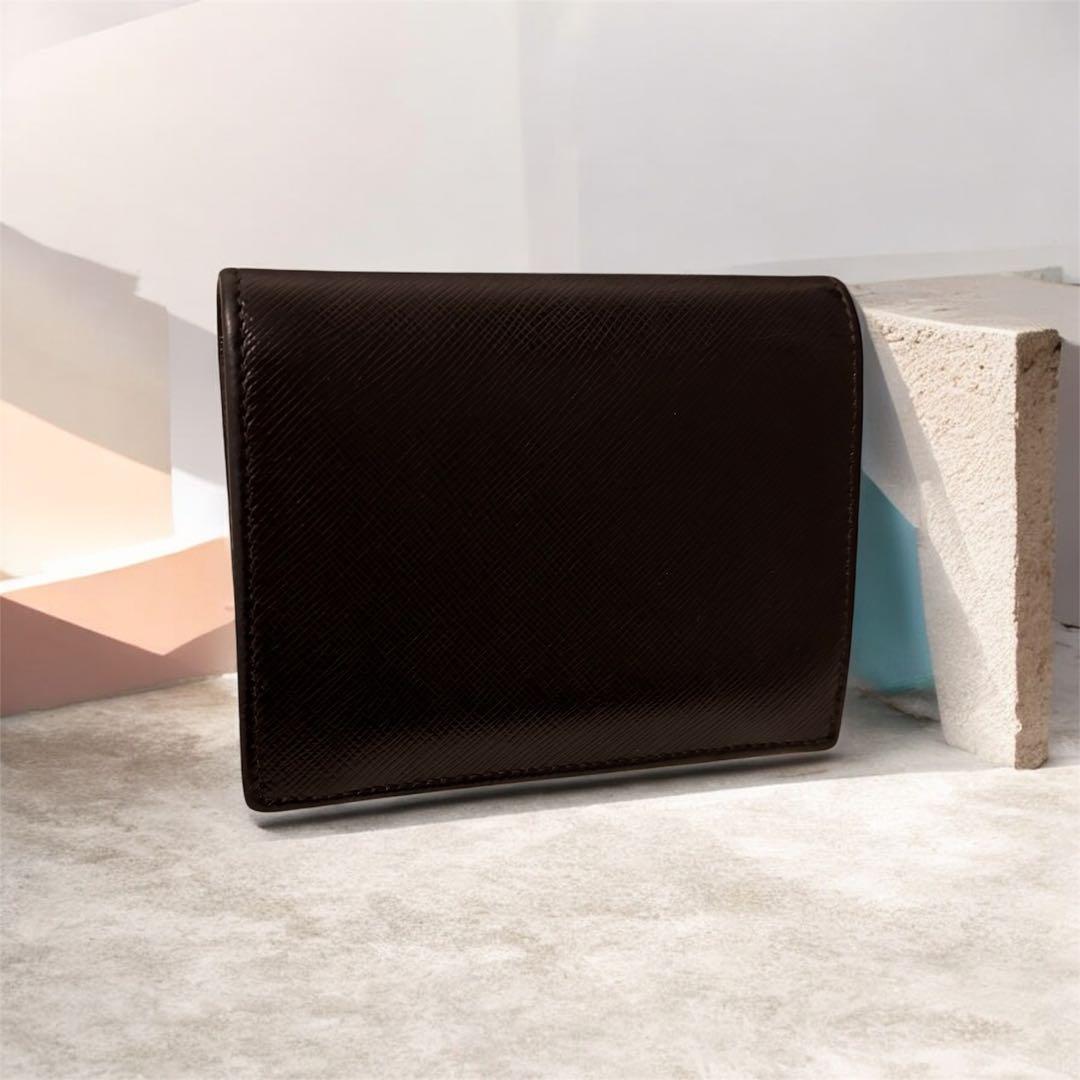 PRADA プラダ 服飾小物二つ折り財布　シリアル85