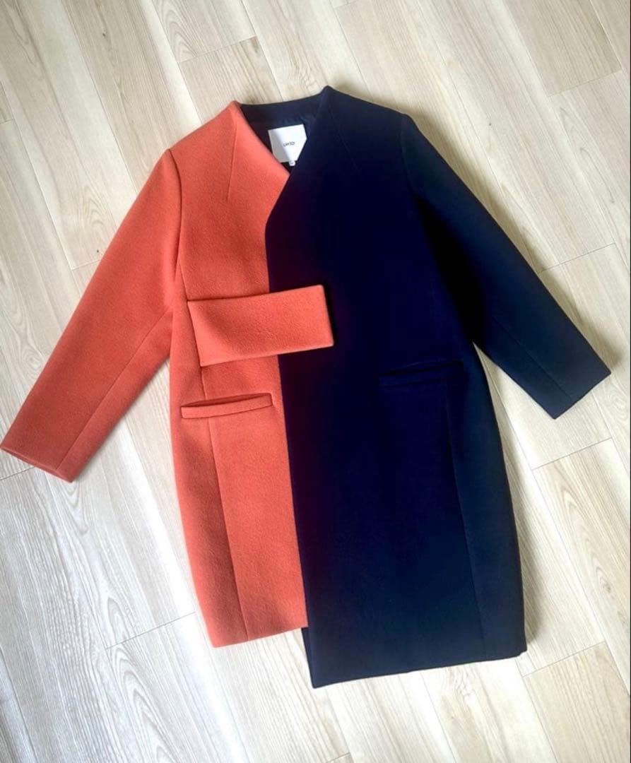 UN3D. アンスリード バイカラーアシンメトリーコート オレンジ×ネイビー