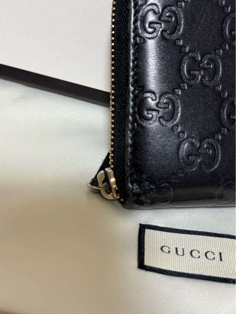 GUCCI グッチ　長財布　エンボスロゴ　GG総柄　黒　ブラック　ジッピー