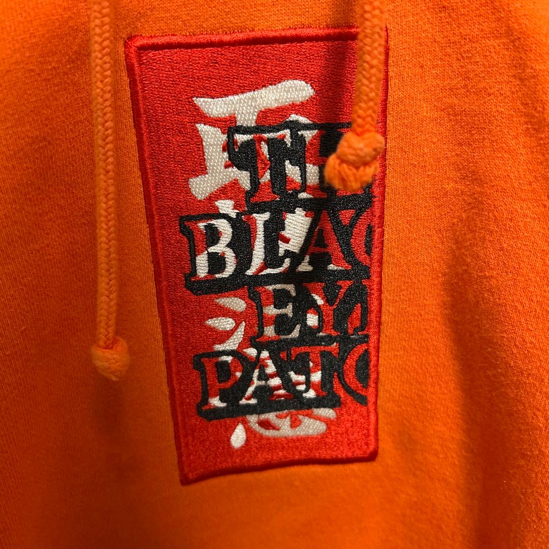 black eye patchブラックアイパッチオレンジパーカー