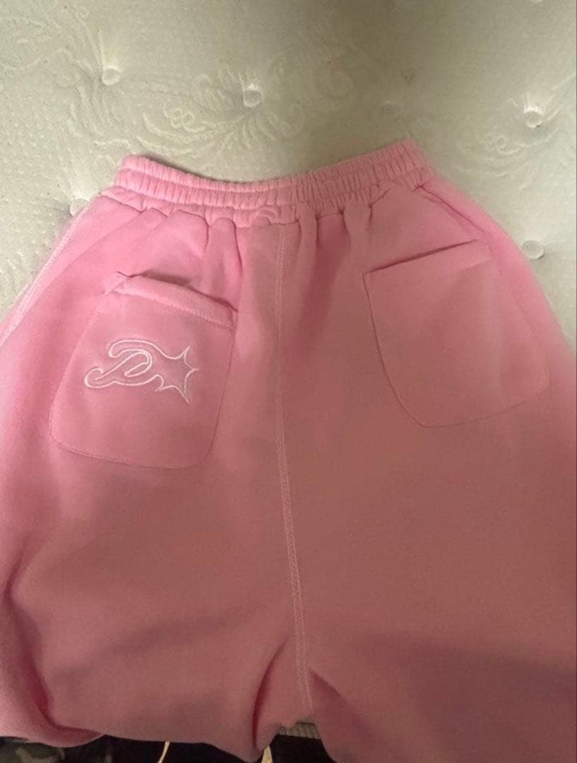 protect ピンク スウェットパンツ