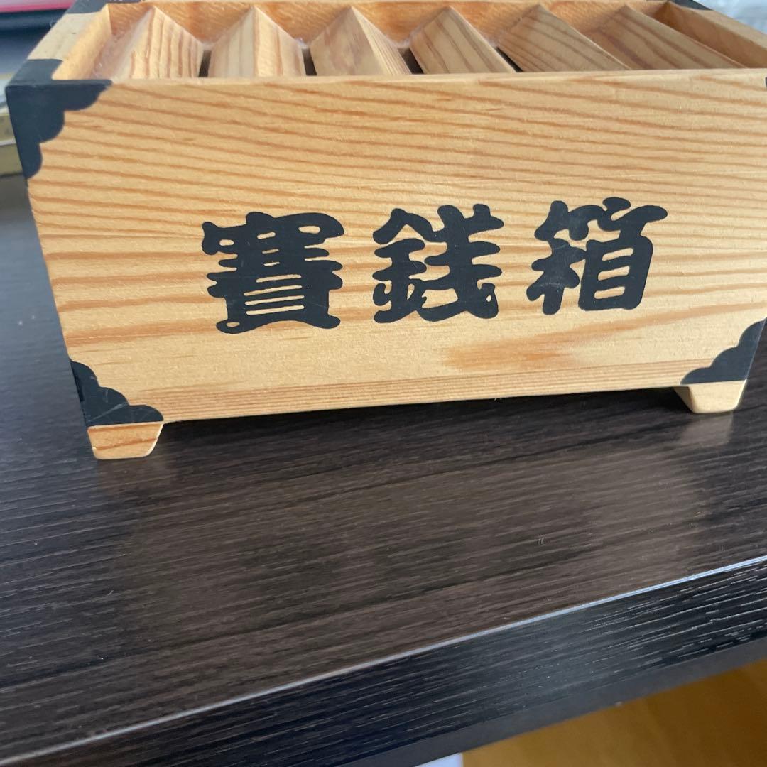 満帆に入った貯金箱