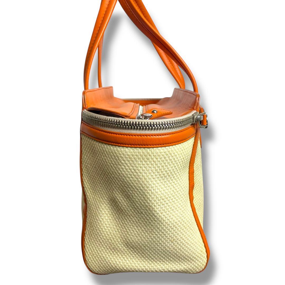 フェラガモ　トートバッグ　キャンバス×レザー　ガンチーニ　オレンジ　アリアナ