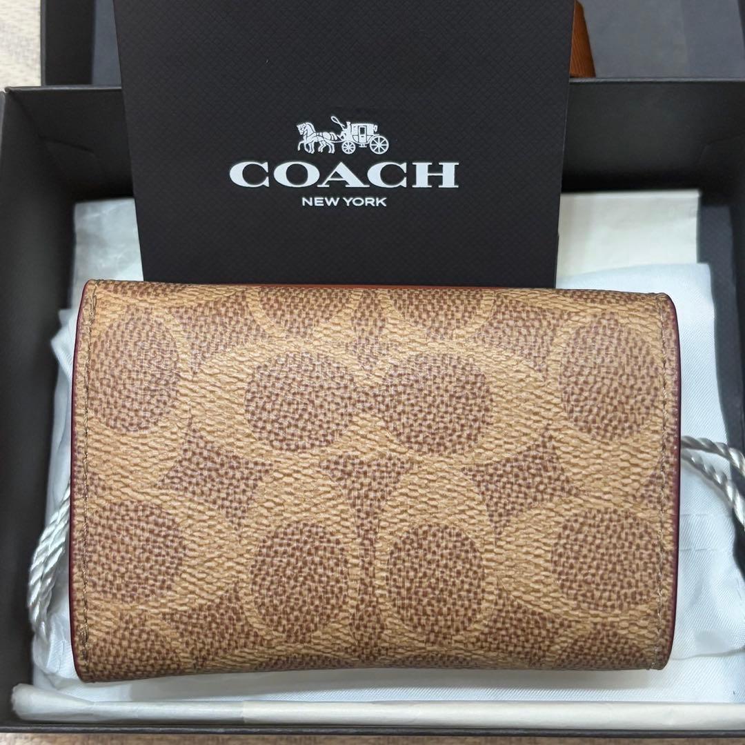 ヤ*ウ様 【新品】COACH ミニ キャンバス トライフォールド ウォレット