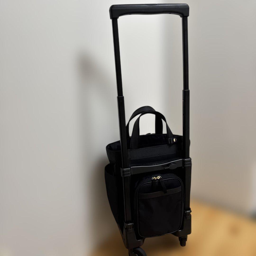 値下げ‼️人気ブランド‼️SWANY‼️スワニー4輪キャリーバック（レインカバー付き）